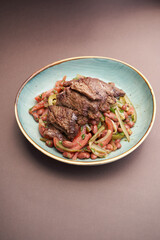 Beef and beans salad with tomatoes and pickles