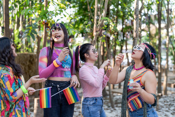 LGBTQIA Asian gay Supporters of the LGBTQ community. people having fun at LGBT pride parade. Gender Spectrum
