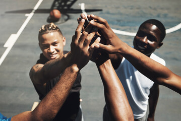 High five, teamwork and basketball in closeup for support, motivation or match on basketball court....