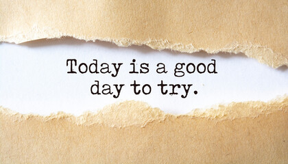 'Today is a good day to try' written under torn paper.