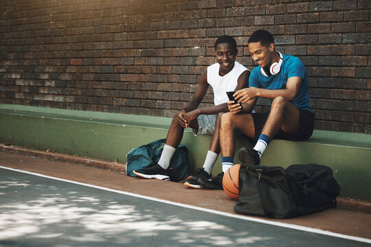 Smartphone, basketball and black people friends with chat mobile app, 5g social networking or training results update on internet. Relax, sports and athlete men using phone for social media community
