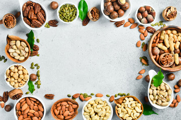 assorted nuts and dried fruit collection. Assorted nuts almonds, pistachio, cashews, walnut. Organic mixed nuts background. Healthy food, useful microelements and vitamins. Useful health snack.