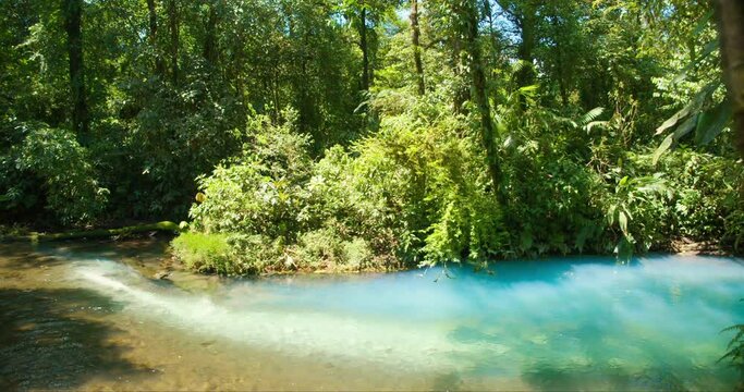 Scenic turquoise optical illusion in Rio Celeste river through Costa Rica jungle