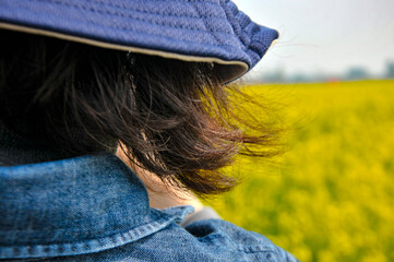 closeup of a chinese woman in hat