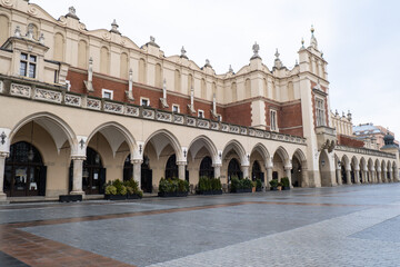 Krakow Main Square Rynek Glowny Poland. Krakow architecture, old city architecture. Historic Roman Catholic church in Krakow Baroque architecture Travel tourist attraction 