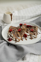 Chocolate french crepes selective focus close up