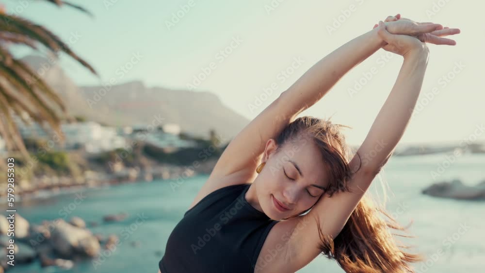 Poster Woman at beach, stretching and yoga with zen and fitness, fresh air and ocean with body care and wellness outdoor. Young female yogi, pilates and breathing, warm up and calm, meditation and balance