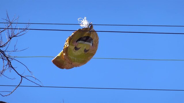 deflated emoji balloon having a bad day, mental health concept