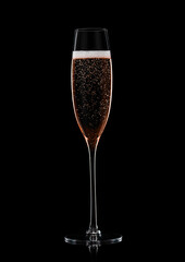 Original glass with pink rose champagne on black background.
