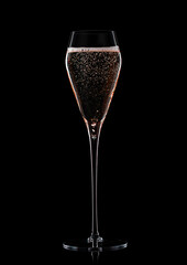 Prosecco wine and pink rose champagne glass on black background.