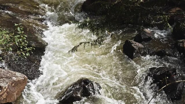 Powerful River Stream Flowing At Datanla Waterfall In Da Lat, Vietnam. Slow Motion tilt up shot