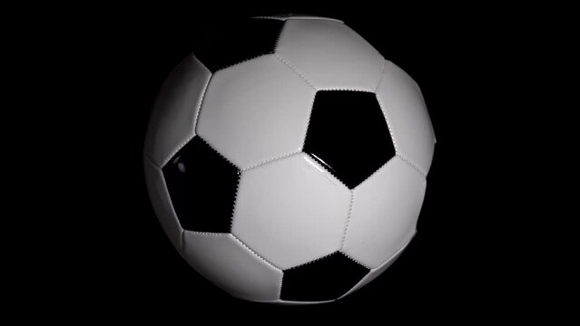 Soccer Ball Rotating On Black Background