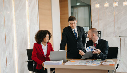  Young business creative team are brainstorming planning discussing while sitting in creative business discussing work in the office