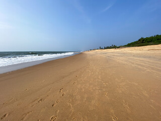 Fototapeta na wymiar A beautiful beach with no people in the village of Sinquerim in North Goa.
