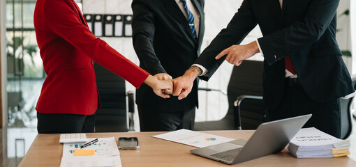  Hands of business people join together their hands together on unity concept