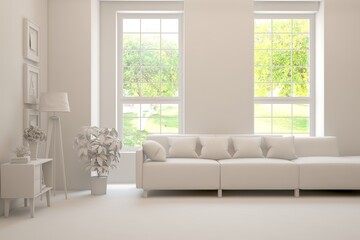 White living room with sofa and summer landscape in window. Scandinavian interior design. 3D illustration
