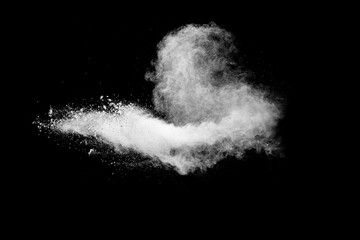 White powder explosion clouds.Freeze motion of white dust particle splash.