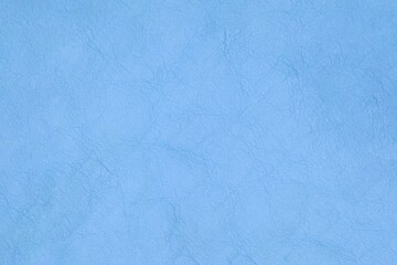 Light blue leather cut as background textured and wallpaper. Rustic style