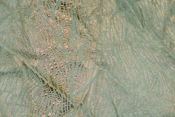 Golden Zebra print pattern leather cut as background textured and wallpaper. Rustic style