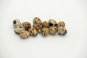 Quail eggs kit on a light background.Animal protein.Useful healthy food and products.Organic farm eggs set