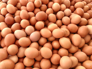 top view raw brown eggs background