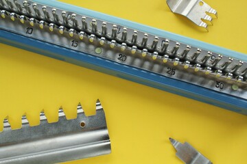 Manual hand knitting machine details. Small business, start up concept. Handmade hobby clothing workshop. Vintage device homeworking equipment
