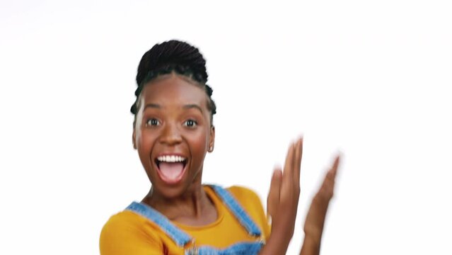 Dance, happy and celebration with face of black woman for achievement, smile and energy. Freedom, music and excited with girl dancing for confident, promotion and winner in white background studio