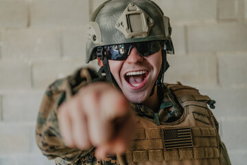 I choose you. A soldier with an outstretched hand towards the camera shows that he chooses you for support and partnership in warfare