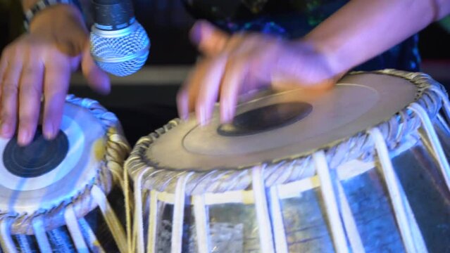playing tabla in closeup view