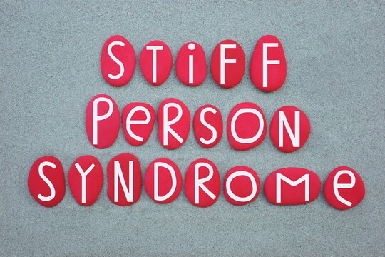 Stiff person syndrome, sps, rare, progressive neurological disorde text composed with red colored stone letters overr green sand