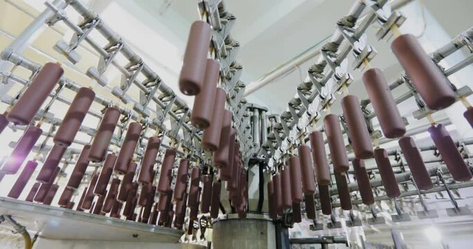 Automated production of ice cream. Automated conveyor line. Modern ice cream factory