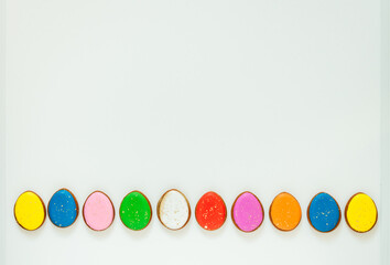 lots of Easter gingerbread on a white background. High quality photo space for text flatly