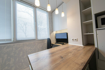 workplace on the balcony combined with the kitchen, bar counter table from the windowsill.