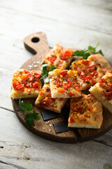 Traditional homemade focaccia with tomatoes