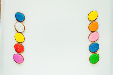 lots of Easter gingerbread on a white background. High quality photo space for text flatly