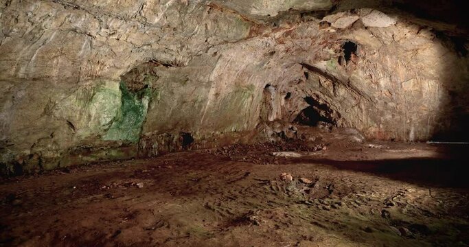 Inside prehistoric cave gallery, shot with a drone