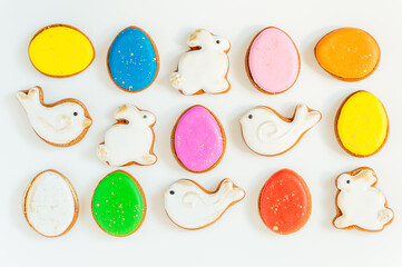 lots of Easter gingerbread on a white background. High quality photo space for text flatly