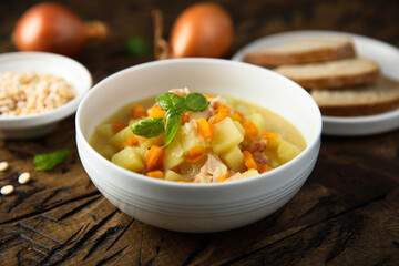 Homemade pea soup with smoked pork