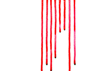 Red water color drips down on white background,Or as drop of blood,Abstract color	