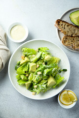 Healthy green salad with avocado