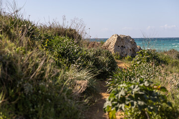 The path to the rock on Qarraba Bay, Malta, Europe