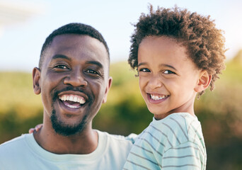 Black family, portrait and dad smile with young child together outdoor with happiness. Happy, smile and father bonding with his kid with parent care, love and support on summer holiday with joy
