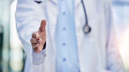 Doctor, handshake and greeting hand gesture to welcome, onboarding and partnership by medical...