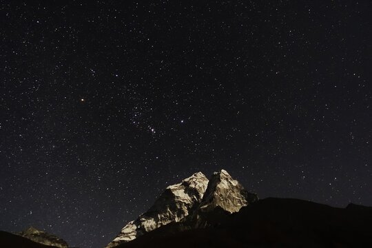 A starry night of Mt. Nuptse near Dingboche, en route to Everest Base Camp. 