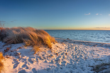 Beautiful Baltic sea beach on the Hel Peninsula at sunset. Poland