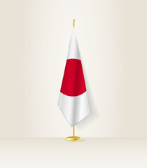 Japan flag on a flag stand.