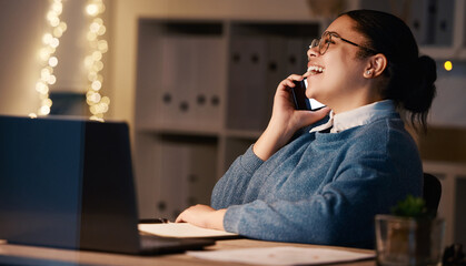 Business woman, phone call and laughing in office at night, chatting or speaking to contact. Bokeh, overtime or happy female employee with mobile smartphone for funny conversation or comic discussion