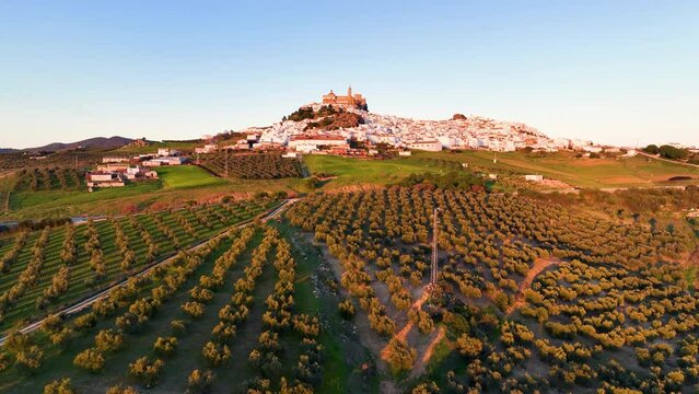 aerial view of Castillo de Olvera Towering On White Village In Olvera, Province of Cadiz, Spain
