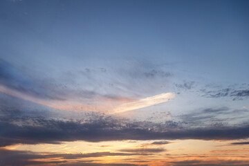 abstract background of cloudy sunset sky golden hour