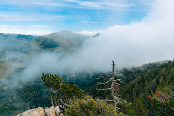 Clouds over the mountain peak